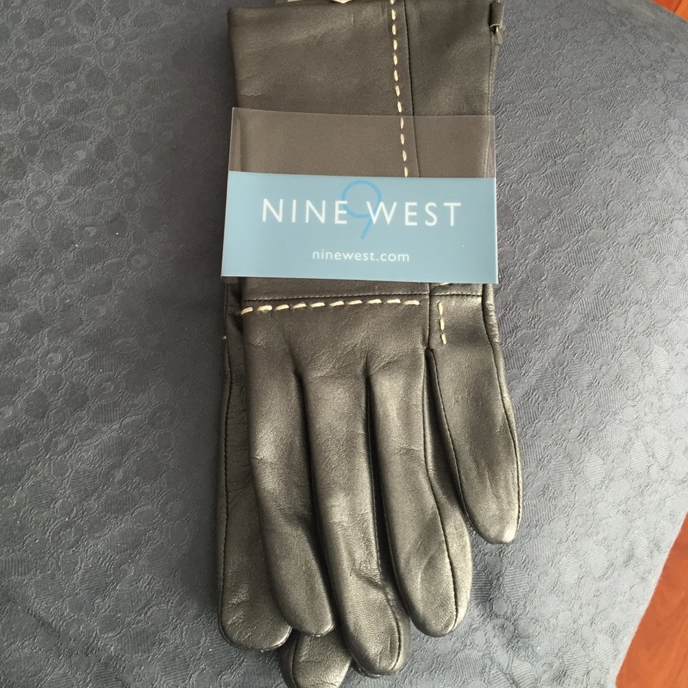 Nine West silver/pewter color leather gloves, runs small (7.5-8).